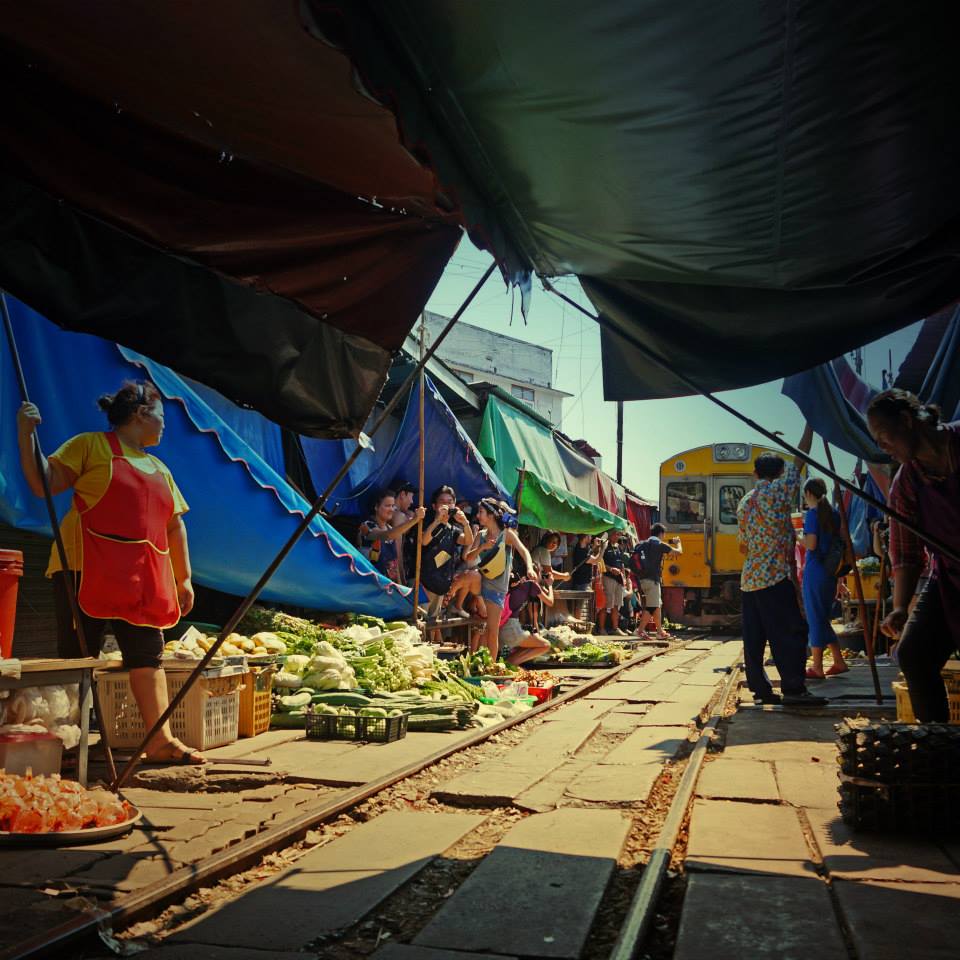 «There was a market here once. Then they built the railway. But why should this affect our market? It has always been done here and we keep it here.<br>So we rather continue our selling in this place and took quickly everything out of the tracks as soon as the train comes, three times per day.»<br><br>- Thai girl summarizing the Thai mentality, at Maeklong Railway Market 