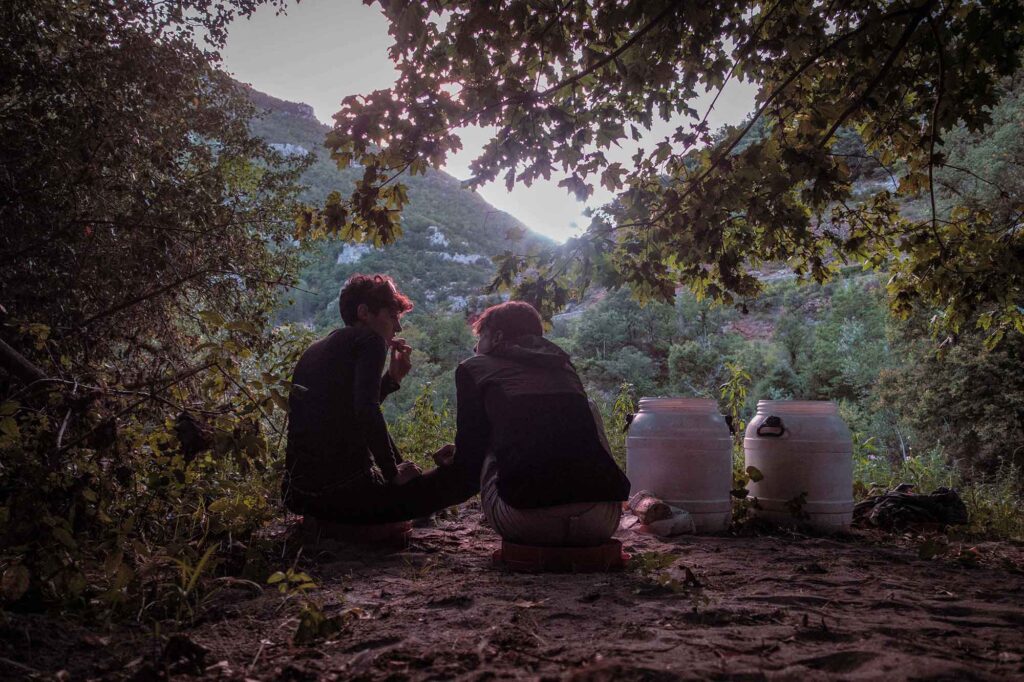 Day 2<br><br>That feeling of sweet comfort, after having found a hidden shelter, set up the tent and wore dry warm clothes. <br><br>Plus, eating bread and cheese bought on the way, while the sun goes down.<br>Sky is pink.